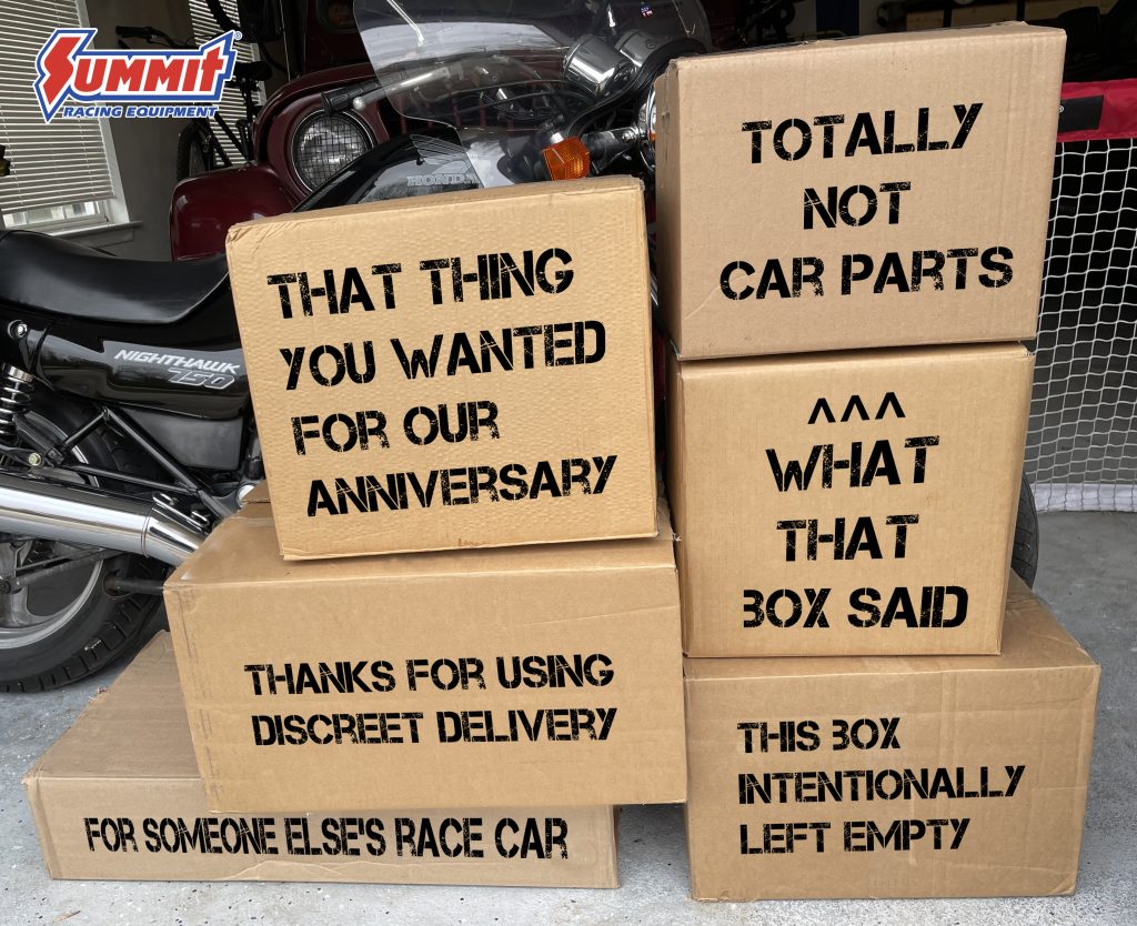 big stack of cardboard boxes in garage