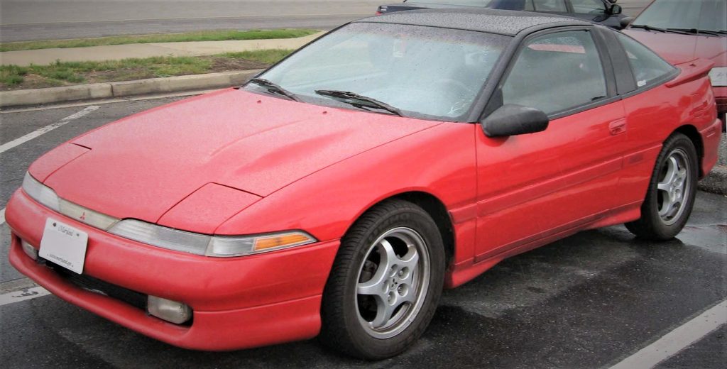 1st gen mitsubishi eclipse, in red
