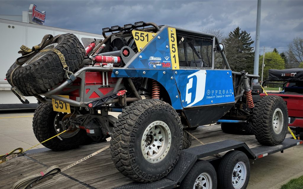 Off-road ULTRA4 race buggy on trailer, rear