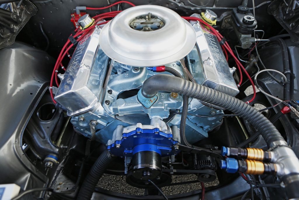v8 race engine in a pontiac firebird drag race car