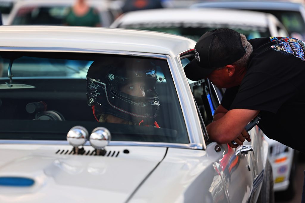 driver and chief discussion before drag race