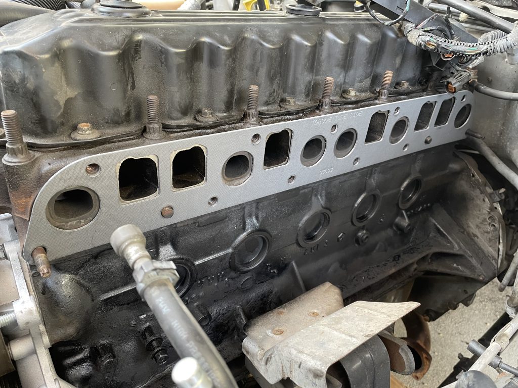 header gasket in place on a Jeep Cherokee xj 4.0L