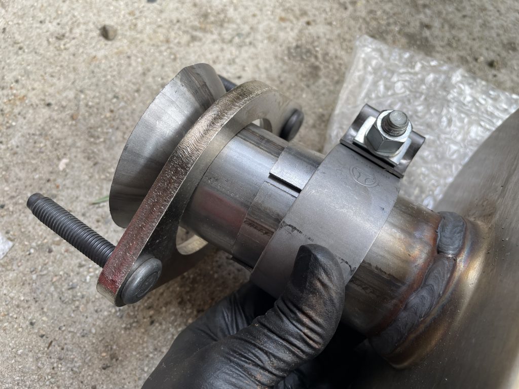 close up of exhaust system coupler flange