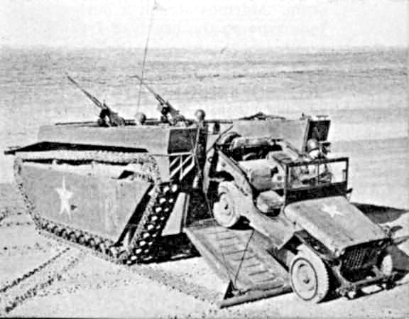 LVT-4 Water Buffalo landing on beach deploying a Jeep