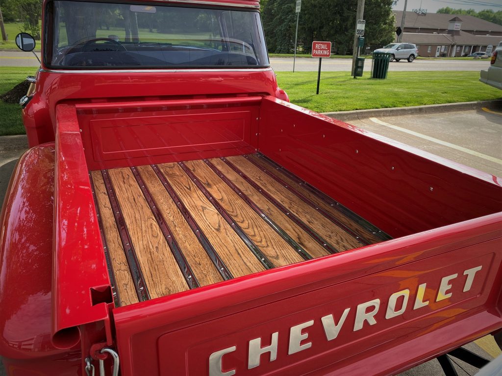 wooden bed in a 1955 chevy 3100 task force truck