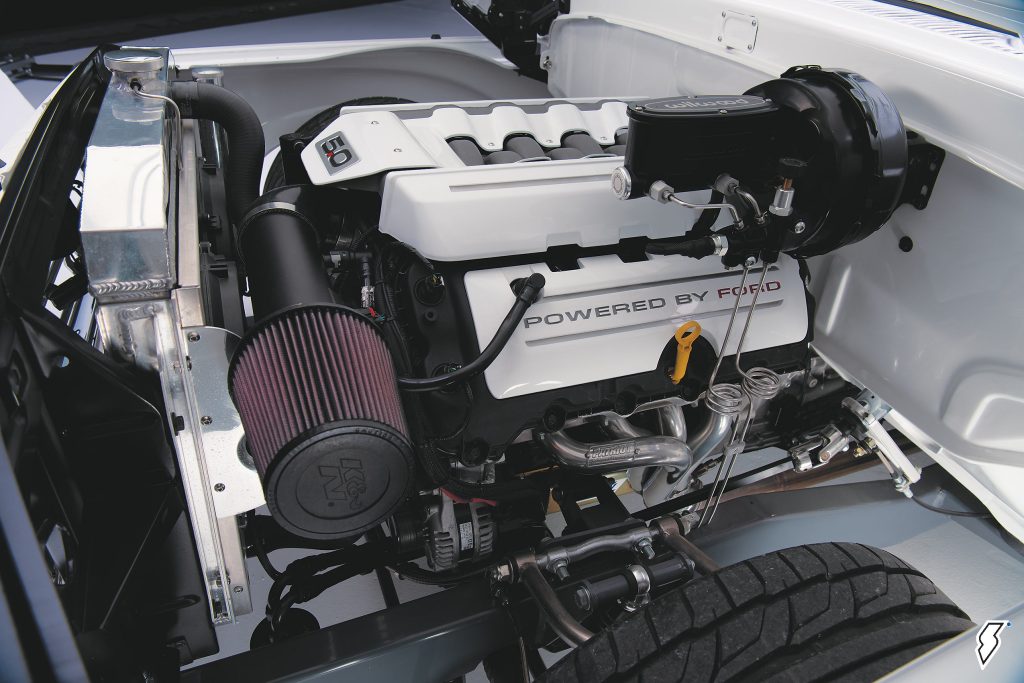 Coyote 5.0L engine in a white 1964 Ford F100 pickup truck restomod